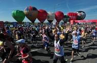 Runners take part in the 2013 London Marathon in southeast London on April 21, 2013